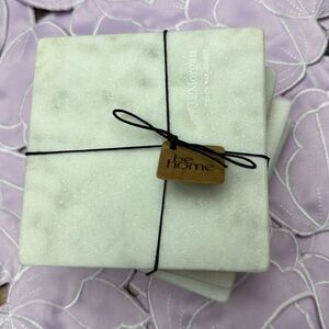 Be Home white marble coasters  coasters set of 4   They are 4” by 4” in size.